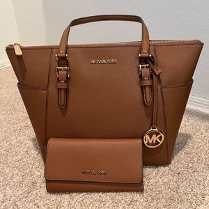 Michael Kors large purse with matching wallet.
